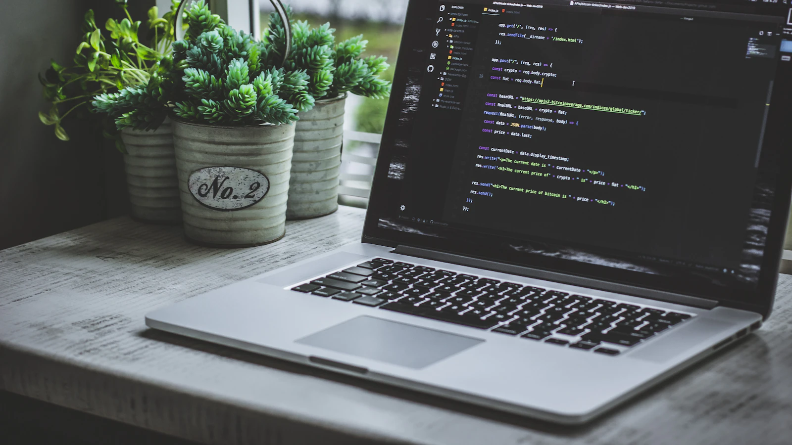 A laptop with a code editor open