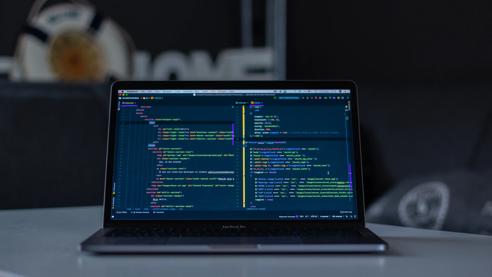 A laptop screen full of source code