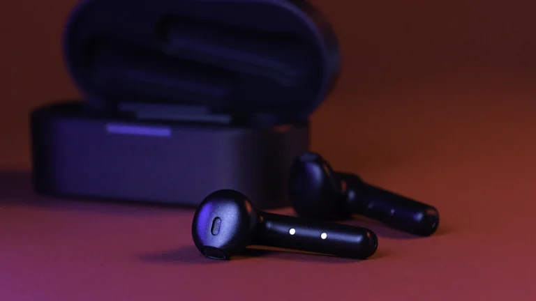 Close up of black true wireless earbuds